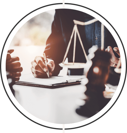 Legal professionals reviewing business and compliance matters